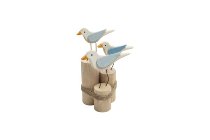 wooden seagulls on wood