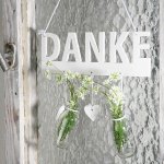 wooden mobile with 2 bottle "DANKE"